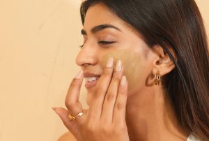 Woman applying a facial mask image on padma home page